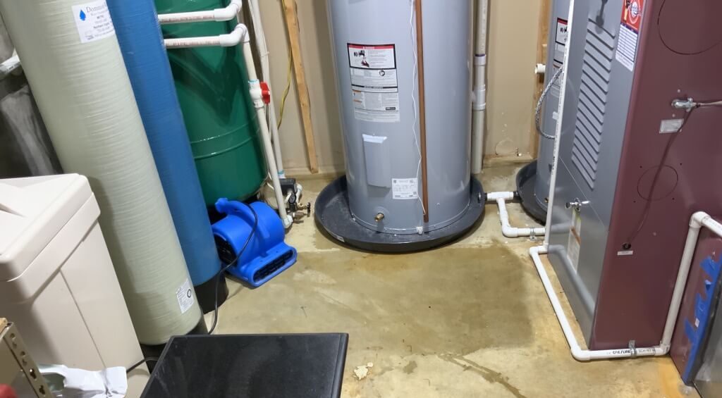 Water Heater Water Damage Inside Utility Room